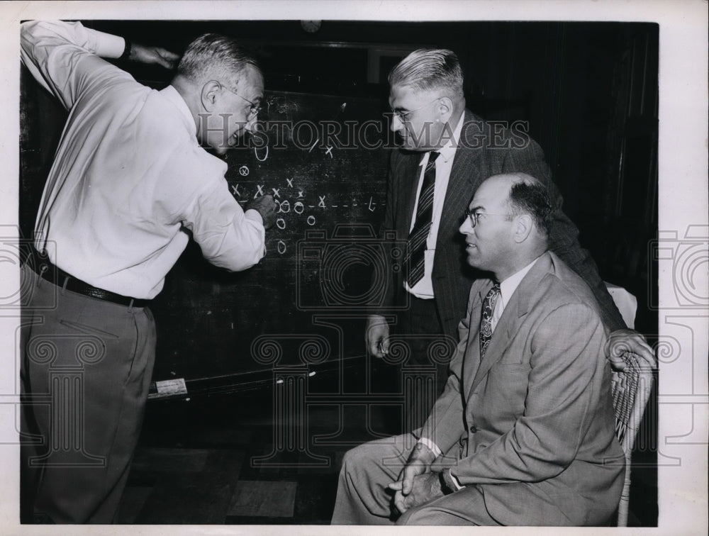 1945 Press Photo James Masker, Lynn Waldorf and Ray Eliot work on referee charts- Historic Images