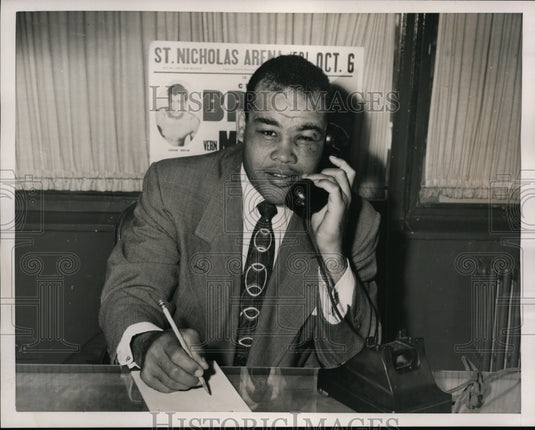 1952 Press Photo Boxer Joe Louis on the phone at St Nicholas Arena - net03250- Historic Images
