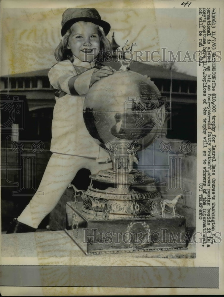1963 Press Photo Patty Frutkoff with trophy for Washington International race- Historic Images