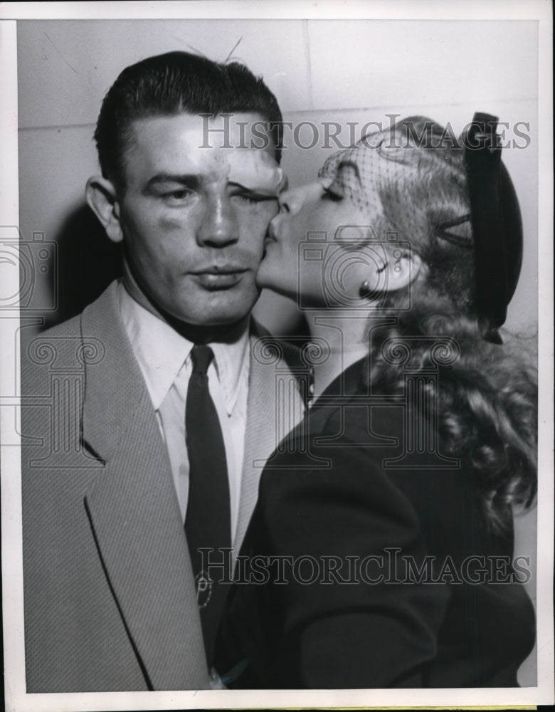 1954 Press Photo Boxer Pierre Lemgolois after loss to Carl Bobo Olson- Historic Images