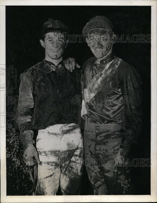 1941 Press Photo Jockey A Schmidl & A Robertson covered in mud at Belmont NY- Historic Images