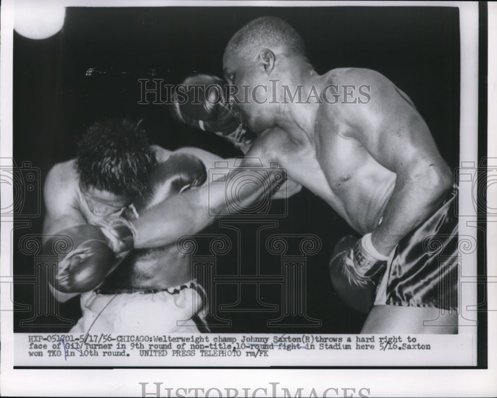 1956 Press Photo Welterweight champion Johnny Saxton punches Gil Turner- Historic Images