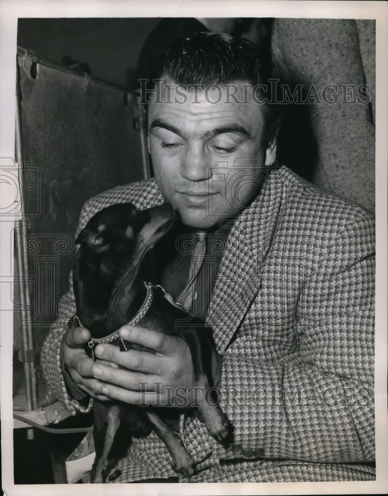 1952 Press Photo Robert Villemain French middleweight boxer &amp; a fox terrier- Historic Images