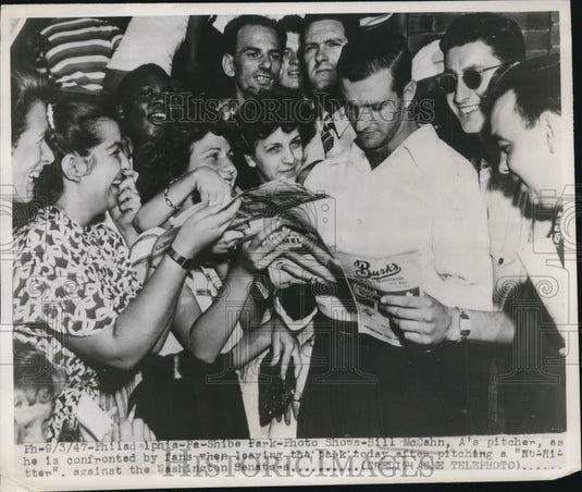 1947 Press Photo Bill McCahn A's pitcher & fans at Philadelphia - net15032- Historic Images