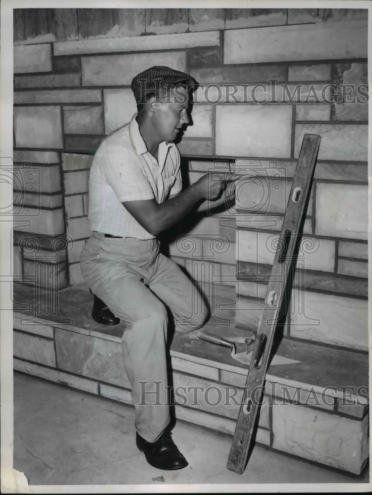1960 Press Photo Dave Sandwice repairs fireplace at Creekwood golf course- Historic Images