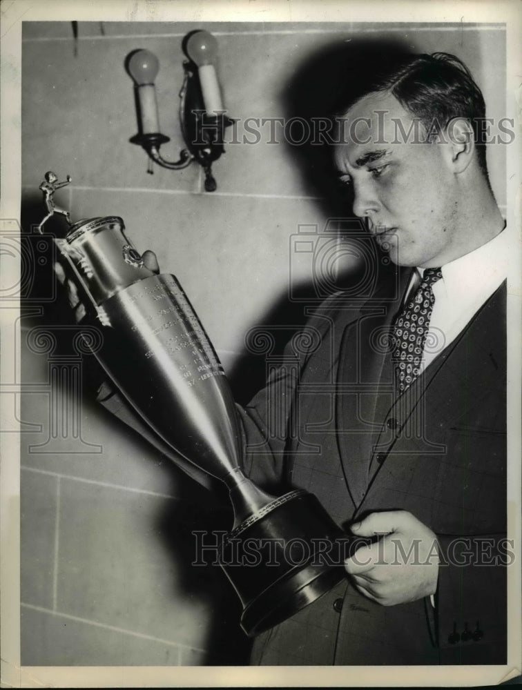 1937 Press Photo Team Captain Robert Mc Namahara Holding A Trophy - net19872- Historic Images