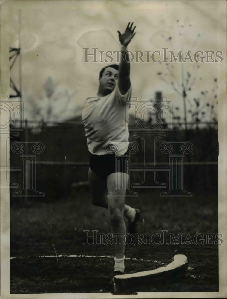 1937 Press Photo Andy Sabanos in an throwing event at track meer - net21301- Historic Images