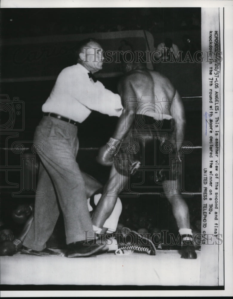 1957 Press Photo Boxer Archie Moore stands over foe Tony Anthony - net28074- Historic Images