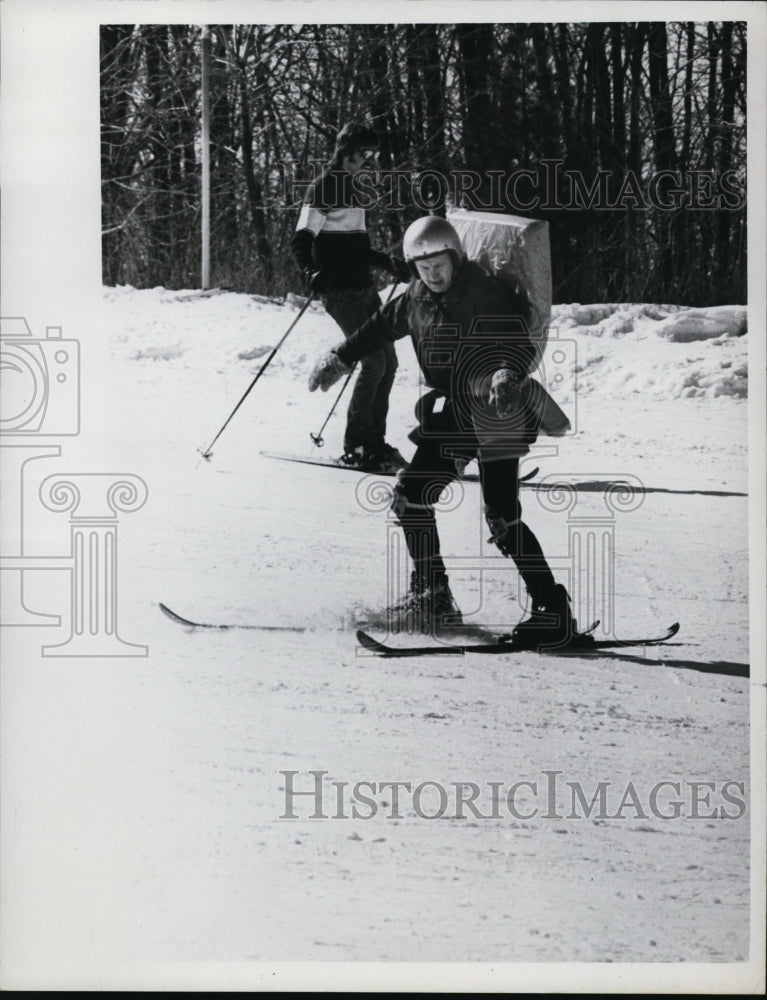 1973 Press Photo two skiers going down a slope - net28766- Historic Images