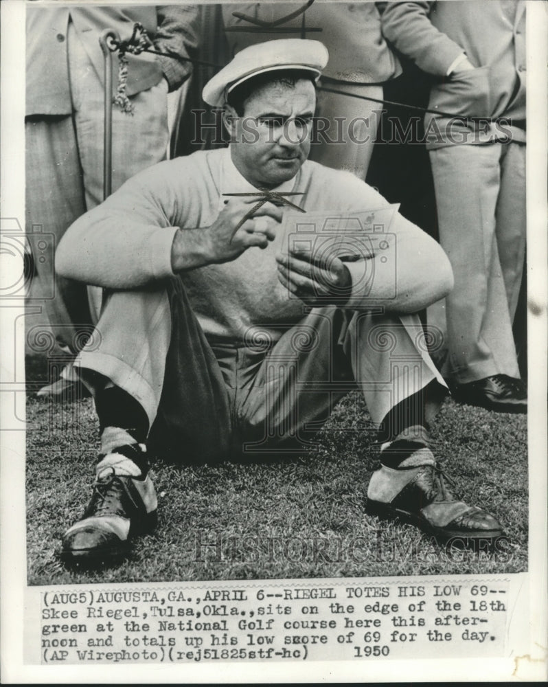 1950 Press Photo Skee Riegel sits on 18th Green and Totals His Low Score of 69- Historic Images