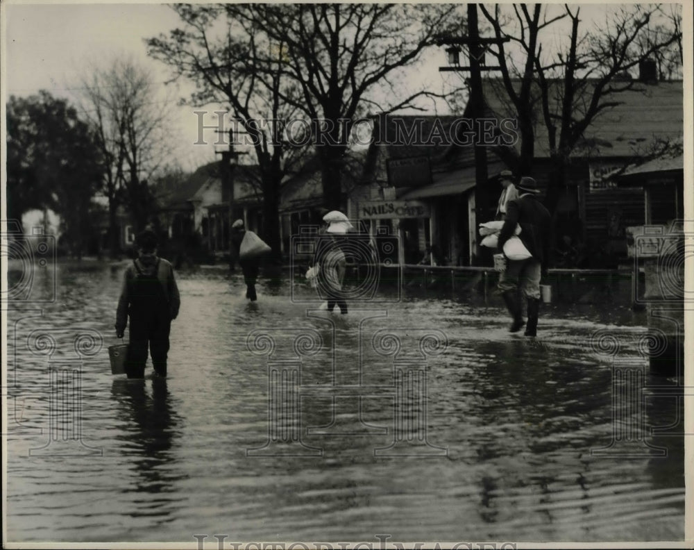 1931 Press Photo Citizens Walk in Flooded Street in Webb, Mississippi