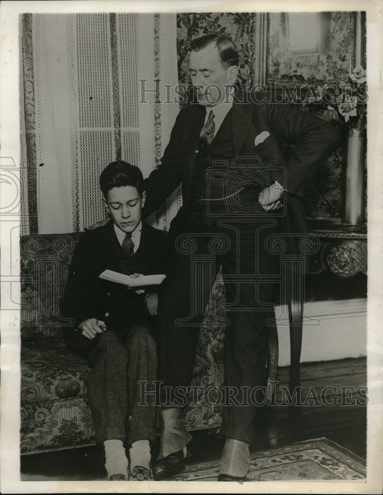 Load image into Gallery viewer, 1929 Press Photo Geoffrey Gill suspended from Leyton Essex High School with his
