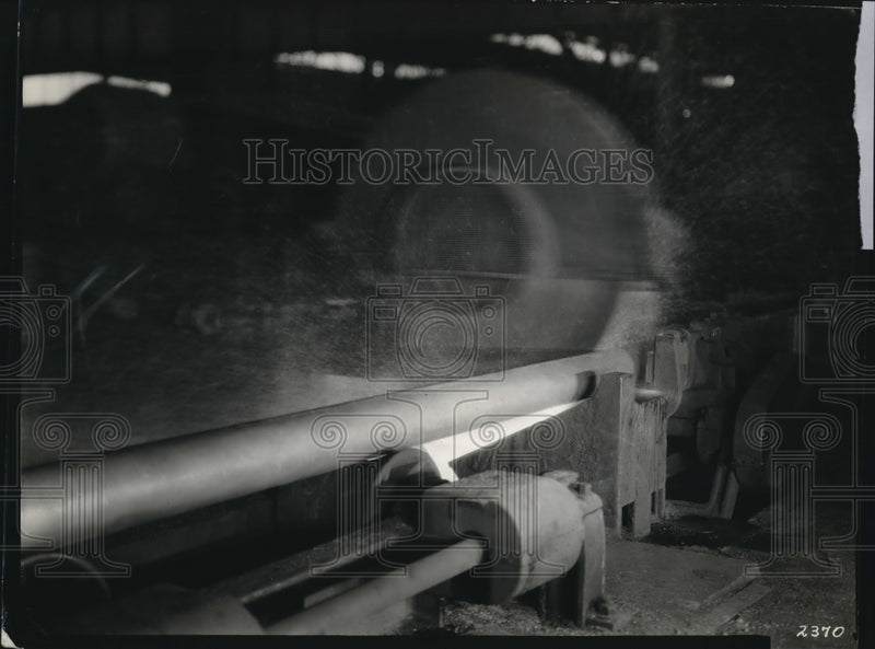 Load image into Gallery viewer, 1937 Press Photo Hot Saw Cutting Pipe, Pilger Seamless Mills, Youngstown Tube Co
