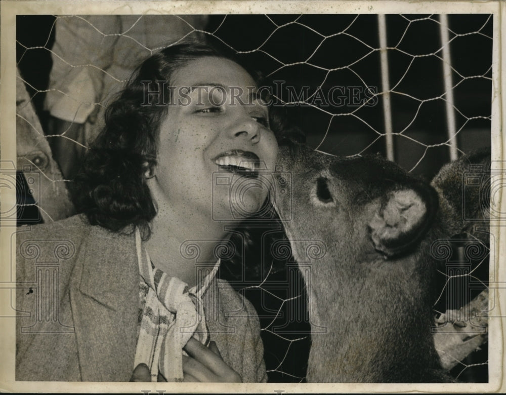 1937 Press Photo Francis Adair kissed by a triplet deer - nex12973