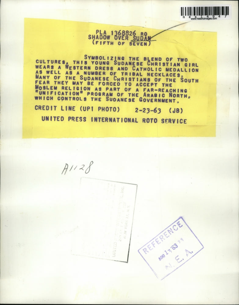 1963 Press Photo In blend of cultures this Sudanese girl wears western dress