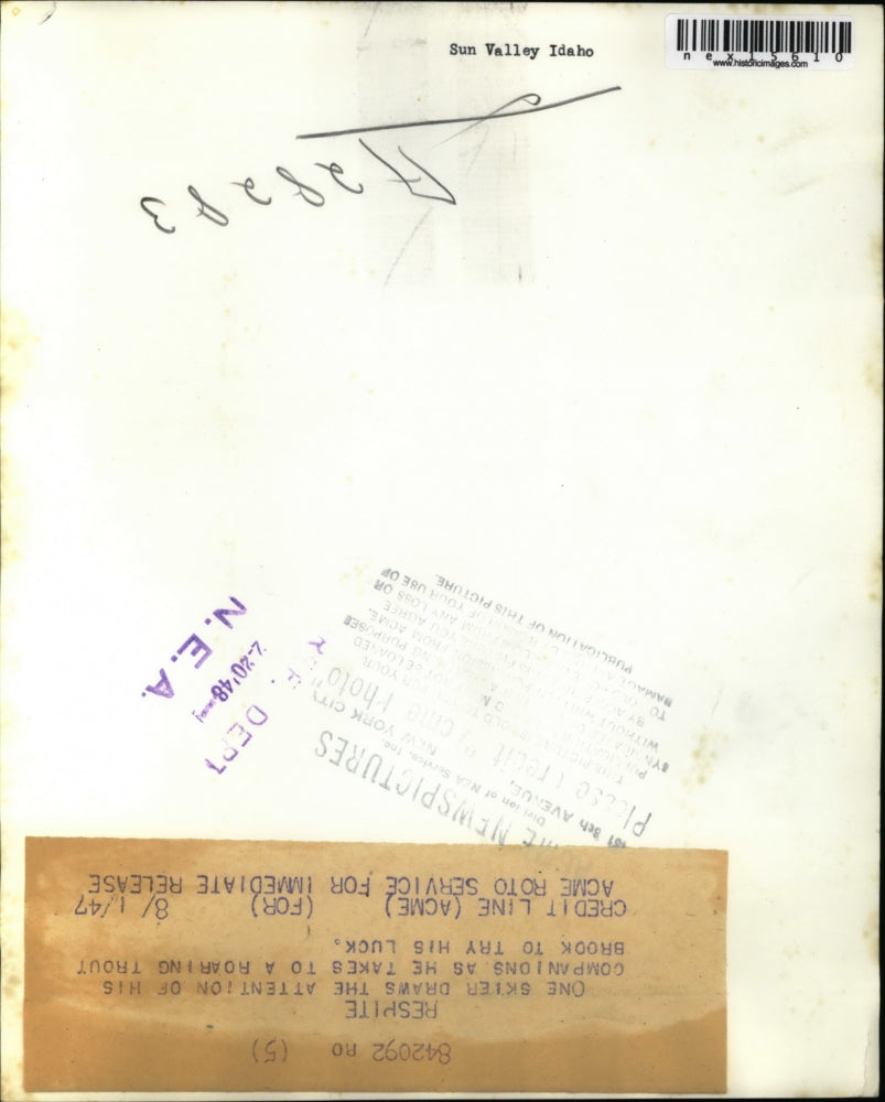 1947 Press Photo one skier draws attention of his companions as he takes to