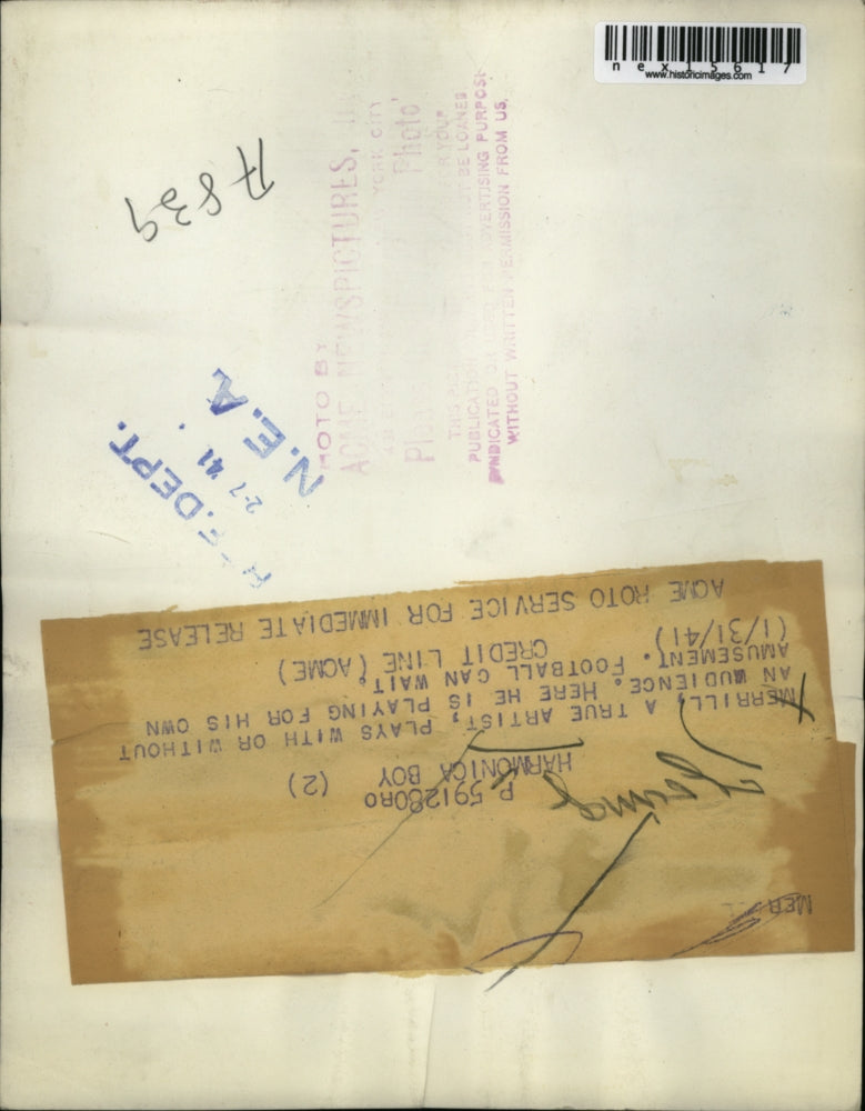 1941 Press Photo Merrill a true artist plays for his own amusement