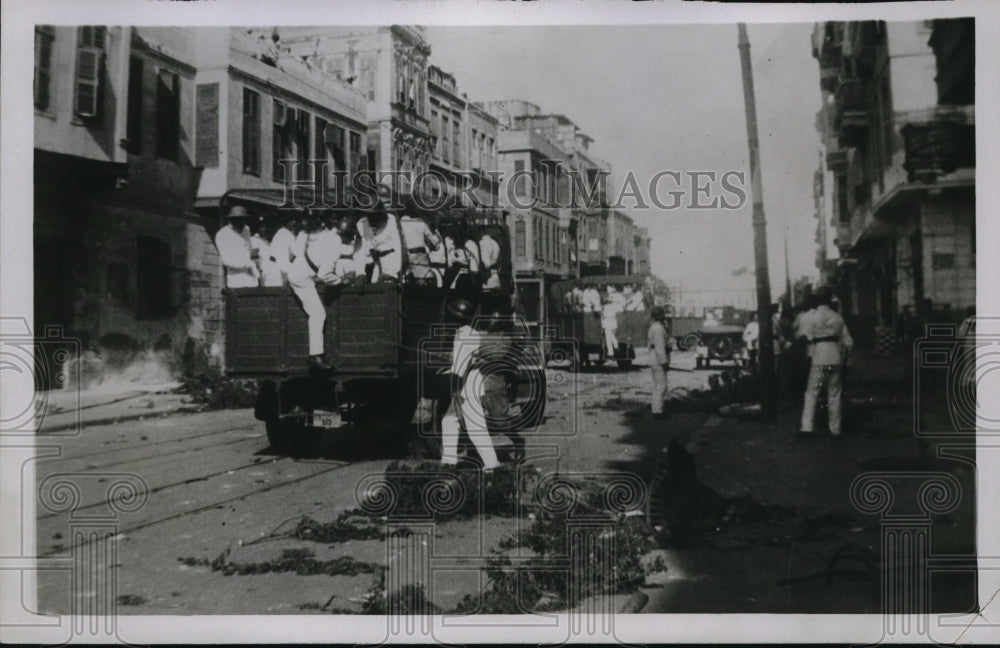 1930 Press Photo Riots in Cairo Egypt police in trucks to disperse crowds