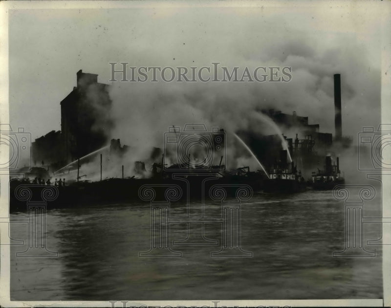 Load image into Gallery viewer, 1932 Press Photo Fireboats pour water Ruins of Quincy Grain Elevator
