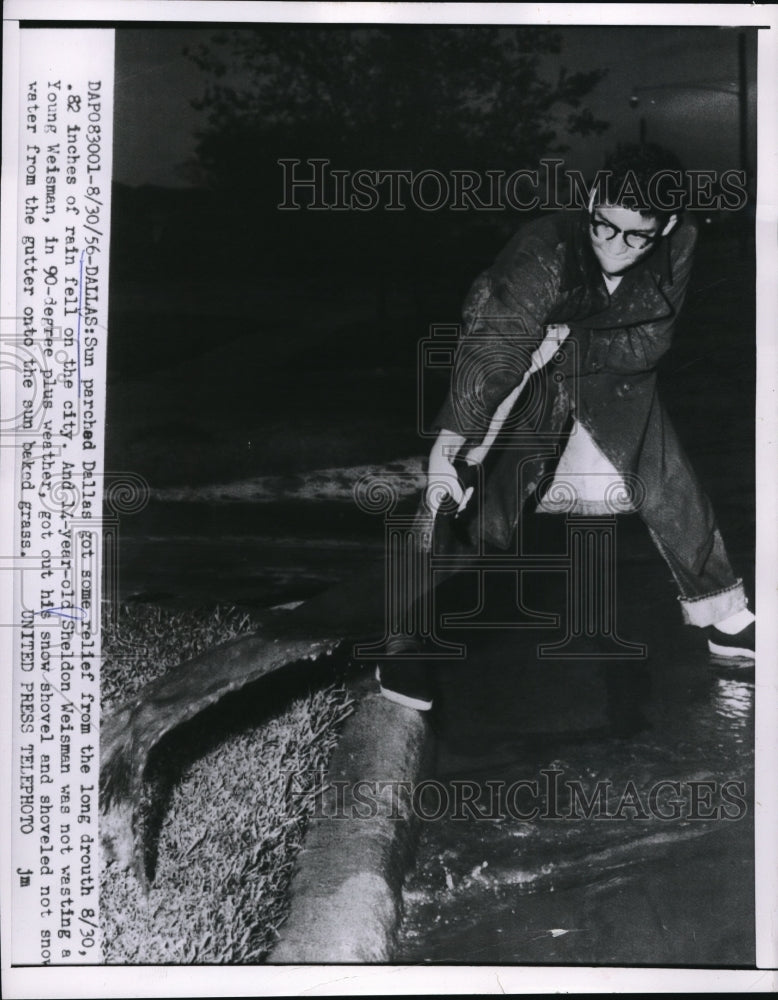 1956 Press Photo Sheldon Weisman Plays In Water After Record Rainfall In Dallas
