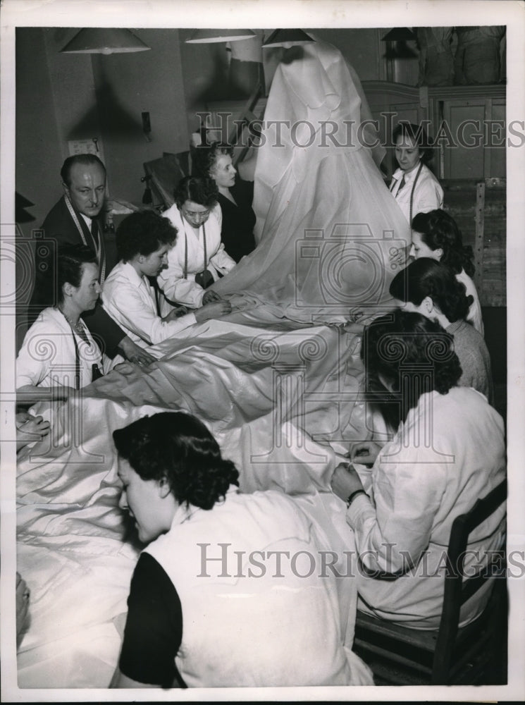Load image into Gallery viewer, 1953 Press Photo seamstresses work on Princess Josephine Charlotte wedding gown
