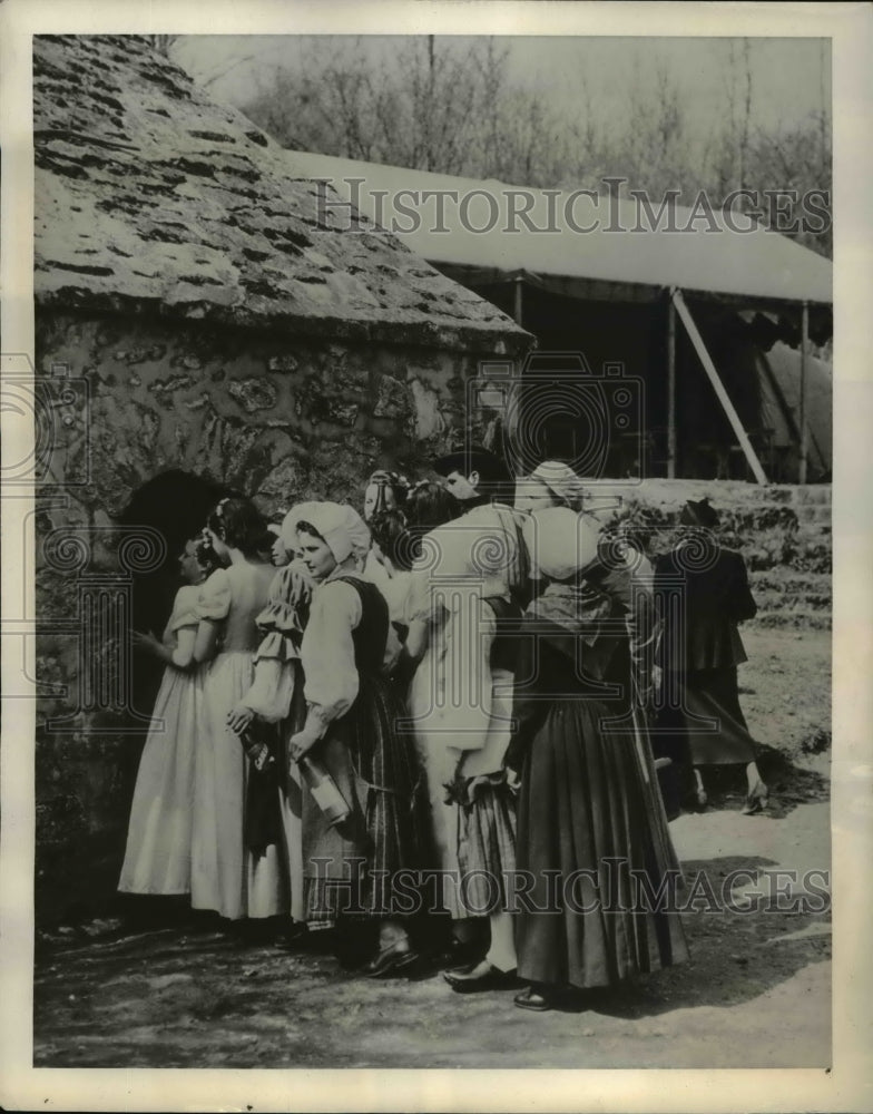 Load image into Gallery viewer, 1939 Press Photo single French girls seeking mates at Aubierge Shrine
