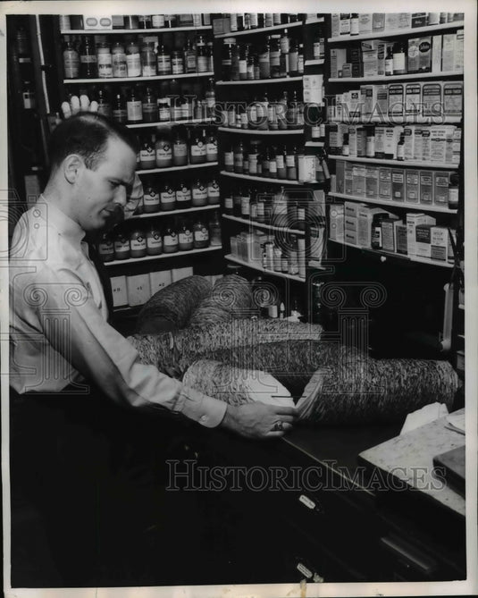 1955 Press Photo John Porr Jr. Is Puzzled At Drug Stores Old System