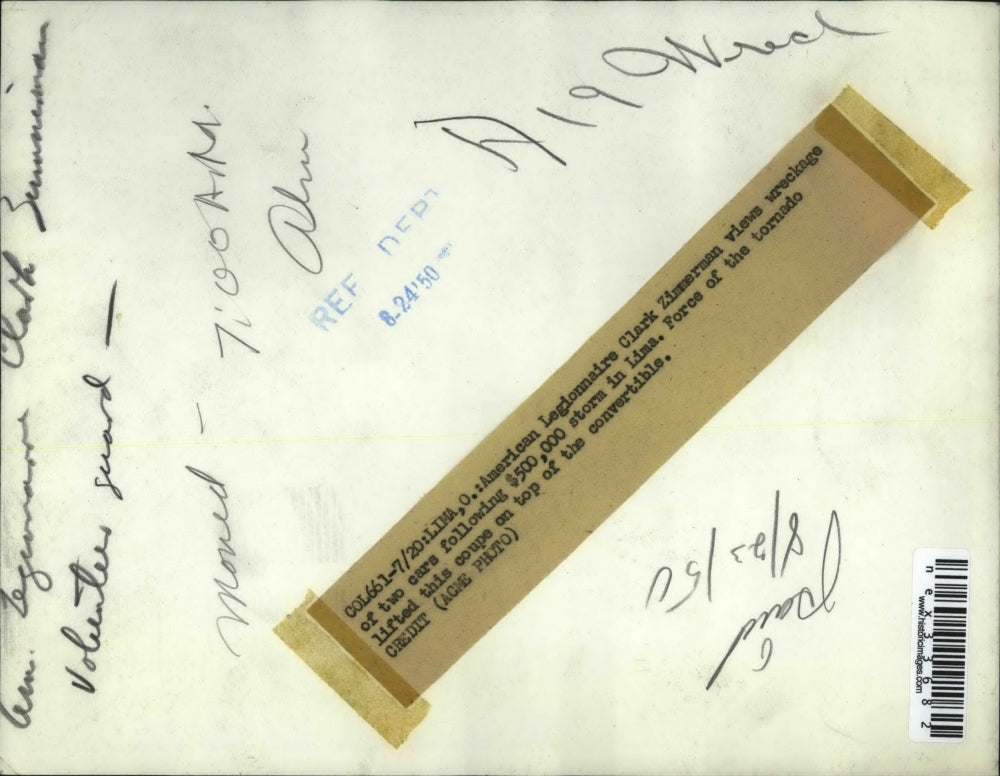 1950 Press Photo American Legionaire Clark Zimmerman & cars hit by tornado