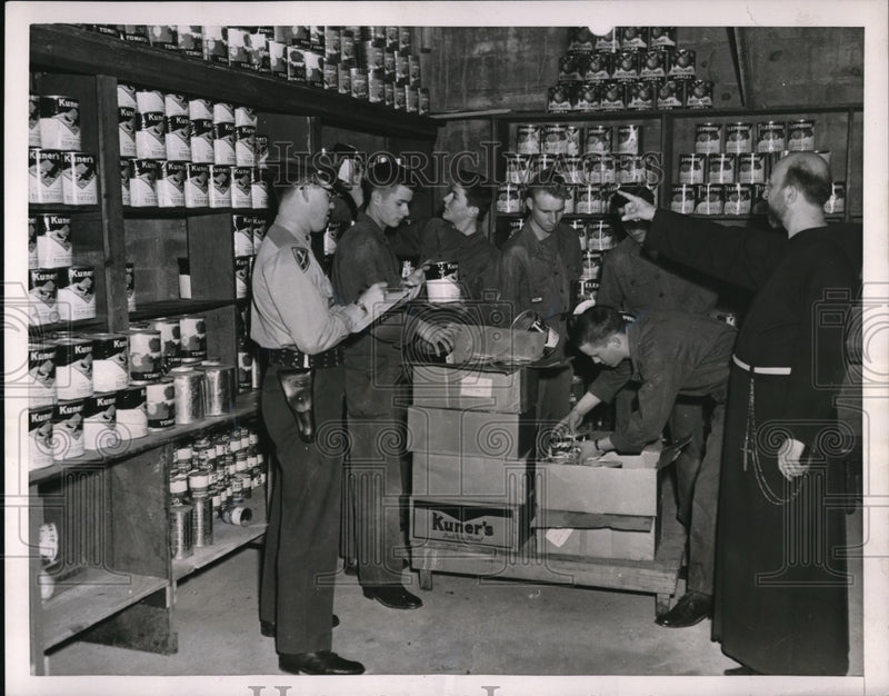 Load image into Gallery viewer, 1953 Press Photo Students of St. Joseph's Military Academy check out food
