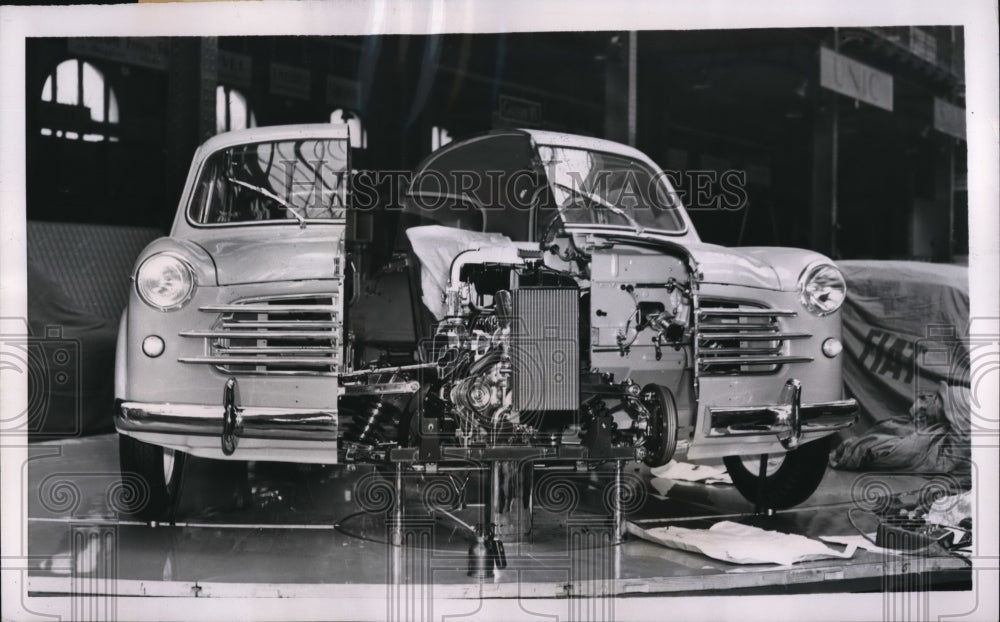 1953 Press Photo Paris France a Italian Fiat taken apart at auto show