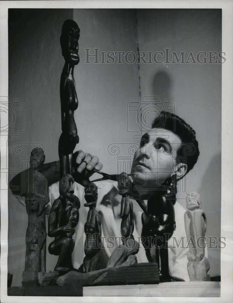 1962 Press Photo David Pantano of Pittsburgh Pa looking at symbolic figures