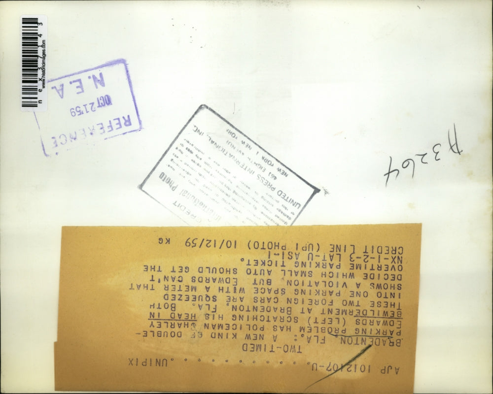 1959 Press Photo Double Parking, Two Foreign Cars Squeezed Inot One Parking Spot