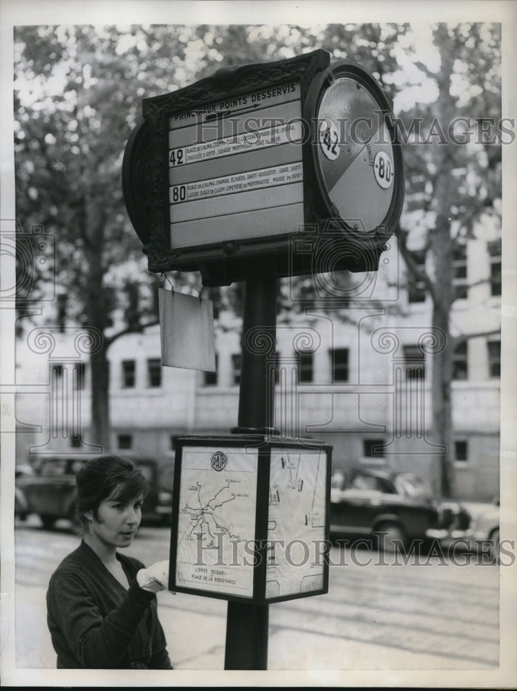 Load image into Gallery viewer, 1957 Press Photo Designed to aid tourist and natives, bus stop poles in Paris
