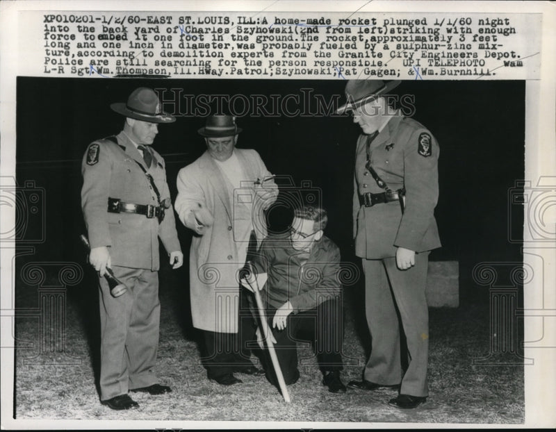 Load image into Gallery viewer, 1960 Press Photo Home-made rocket went into Charles Szyhowski's backyard
