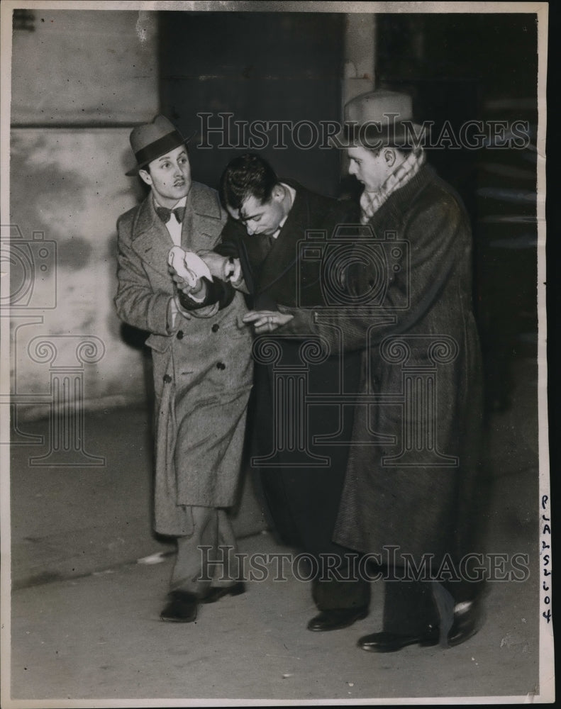 1934 Press Photo Rioter injured from fighting in Rue Royal, Paris