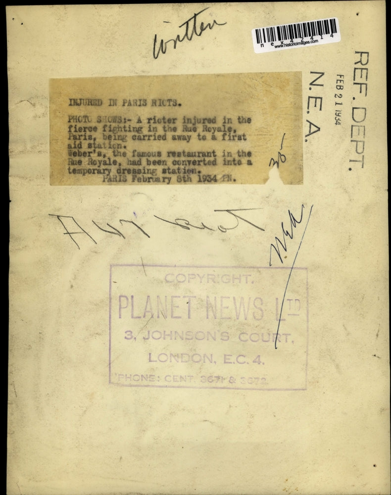 1934 Press Photo Rioter injured from fighting in Rue Royal, Paris