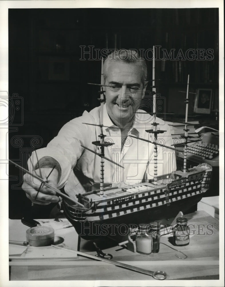 Load image into Gallery viewer, 1963 Press Photo Howard Smith, ABC News Commentator worked on his model ship
