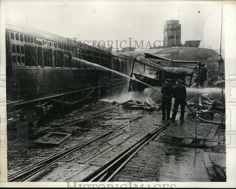 Load image into Gallery viewer, 1935 Press Photo Dover Admiralty Pier explosion of lorry filled with ammo shells
