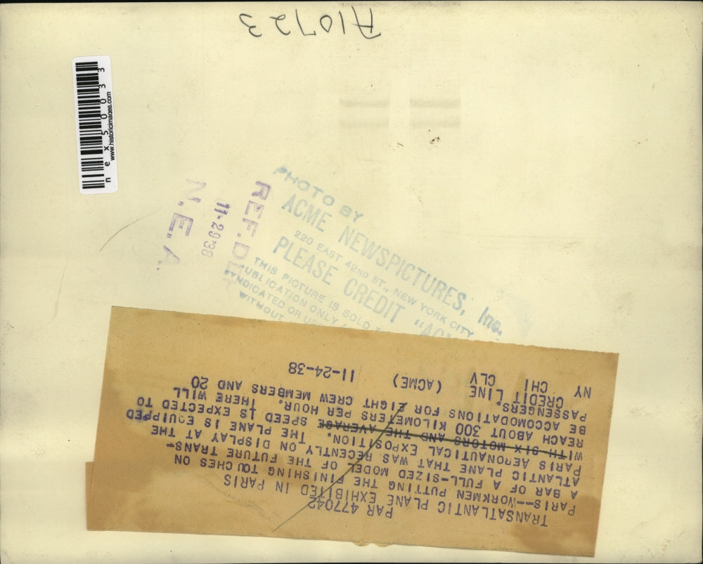 1938 Press Photo Workers Assembling Trans-Atlantic Plane Model, Paris Exposition