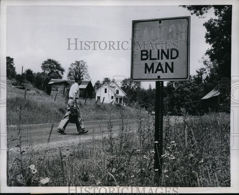 Load image into Gallery viewer, 1957 Press Photo Horatio Hendrick walking to his chicken farm
