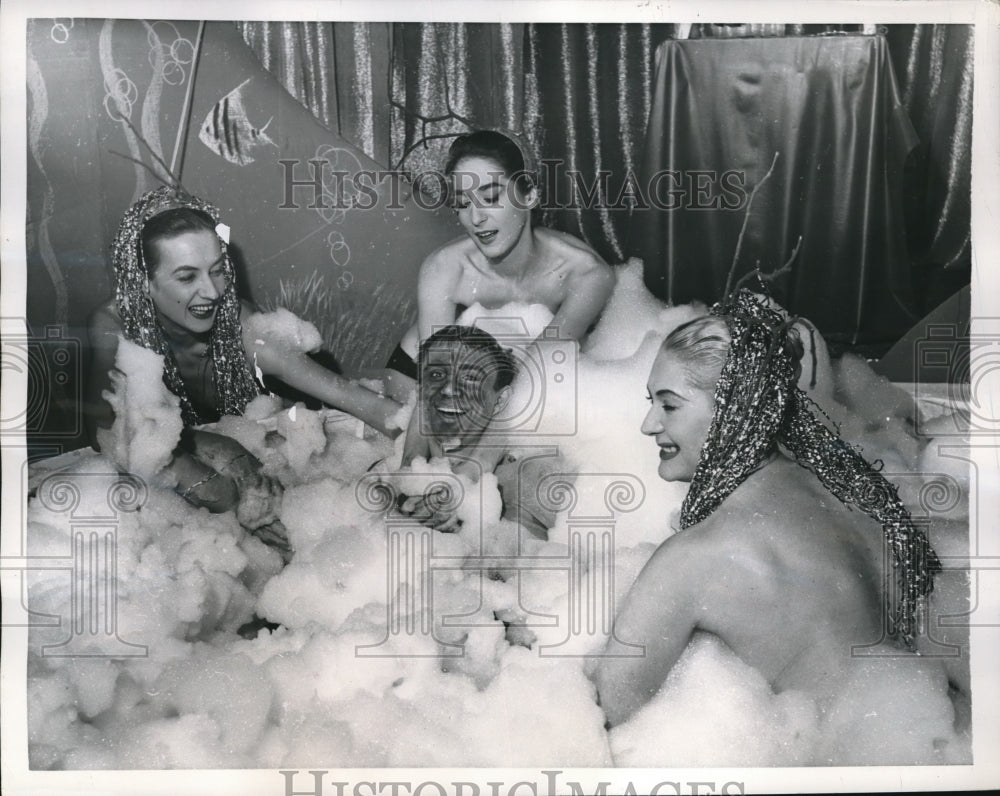 1957 Press Photo French Comedian Claude Vega w/ 3 lovelies