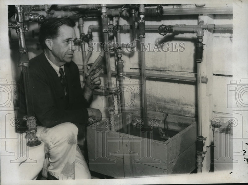 Load image into Gallery viewer, 1934 Press Photo Sanitation Engineers Discuss Plumbing Problems
