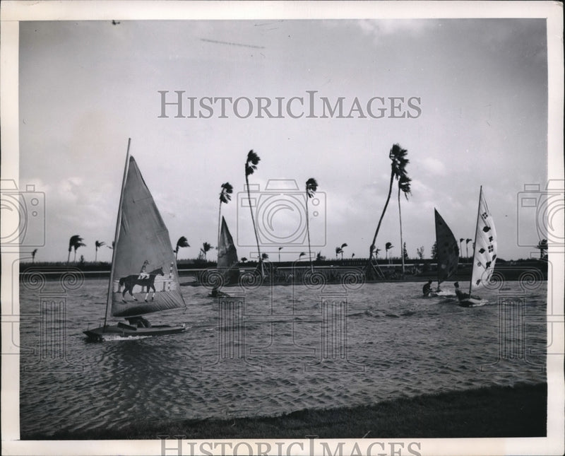 Load image into Gallery viewer, 1947 Press Photo Hollandale Fla sailboats at Gulfstream Park track
