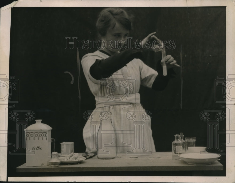 1919 Press Photo Milk samples checked for impurities in a lab