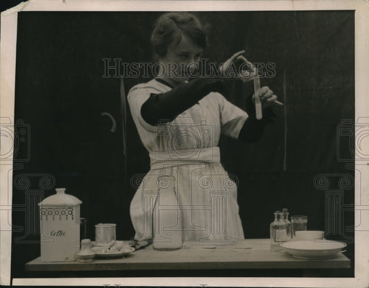 1919 Press Photo Milk samples checked for impurities in a lab