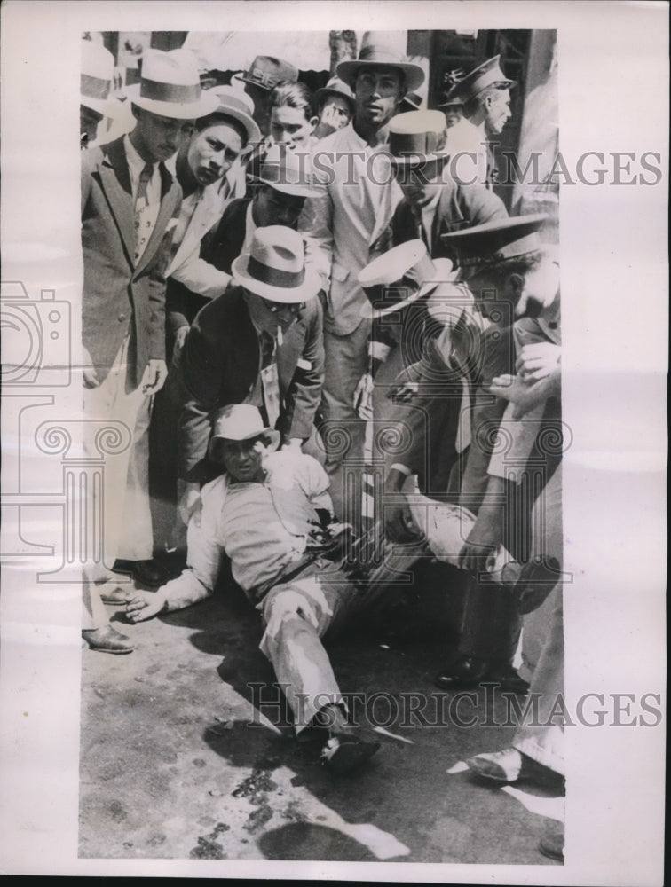 1936 Press Photo Caracas Venezuela man wounded during rebellion riots