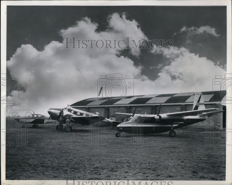 Load image into Gallery viewer, 1958 Press Photo Rynel Gears fleet of five aircraft for sales and engineering
