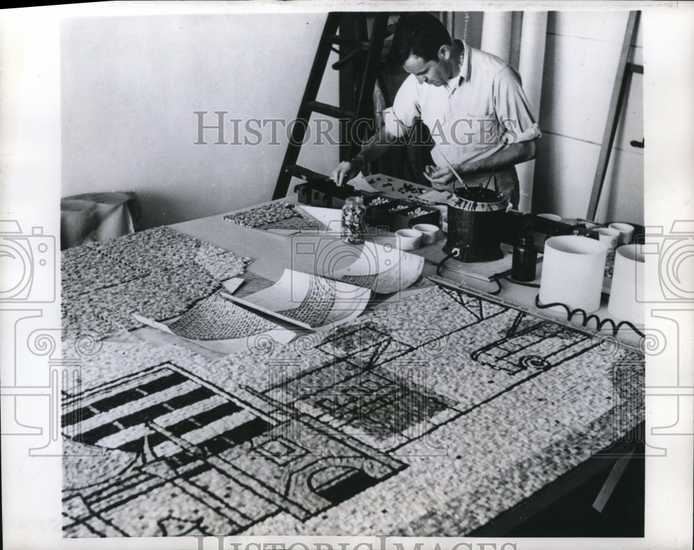 1955 Press Photo Young picked out glass pieces called "Tessera" - nex60270