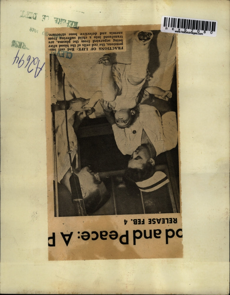 1948 Press Photo Dr & nurse give a child a blood transfusion