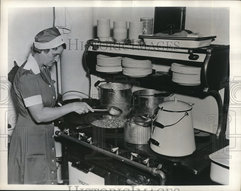 Load image into Gallery viewer, 1942 Press Photo Red Cross Cook Margaret Schultz at Stove
